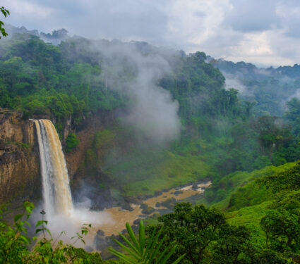 Water,Falls,Down,Out,Of,The,Rock,Though,The,Mist