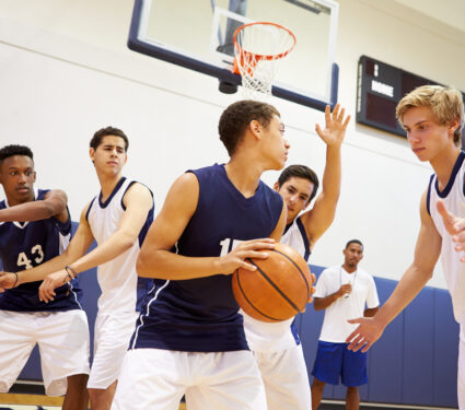 Male,High,School,Basketball,Team,Playing,Game