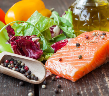 Fresh,Salmon,With,Vegetables,On,A,Wooden,Table