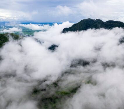 Aerial,View,Of,Mist,,Cloud,And,Fog,Hanging,Over,A