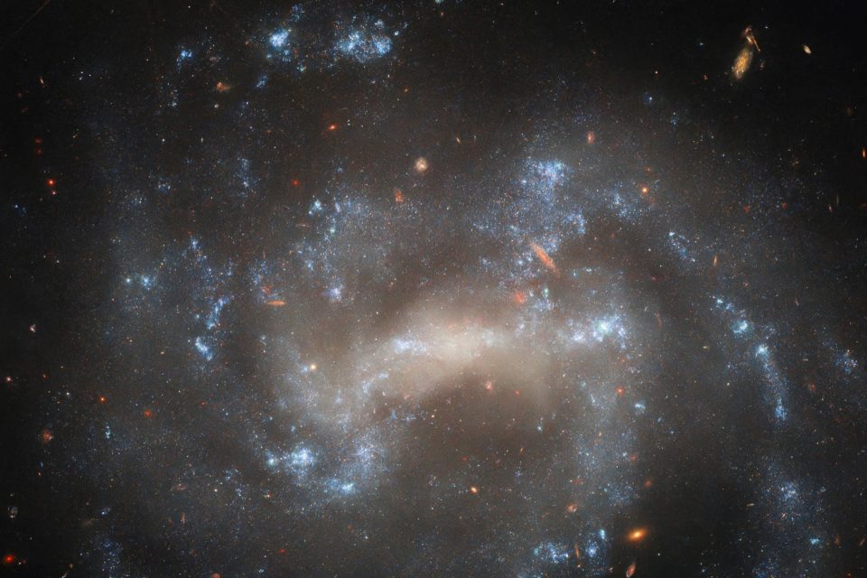 Hubble views a spiral galaxy with stellar explosions