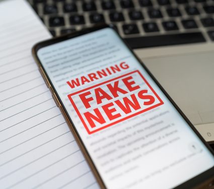 A,Fake,News,Warning,Notification,Appearing,On,The,Phone,While