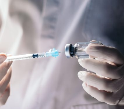 Injecting,Injection,Vaccine,Vaccination,Medicine,Against,Covid-19,Into,A,Syringe.