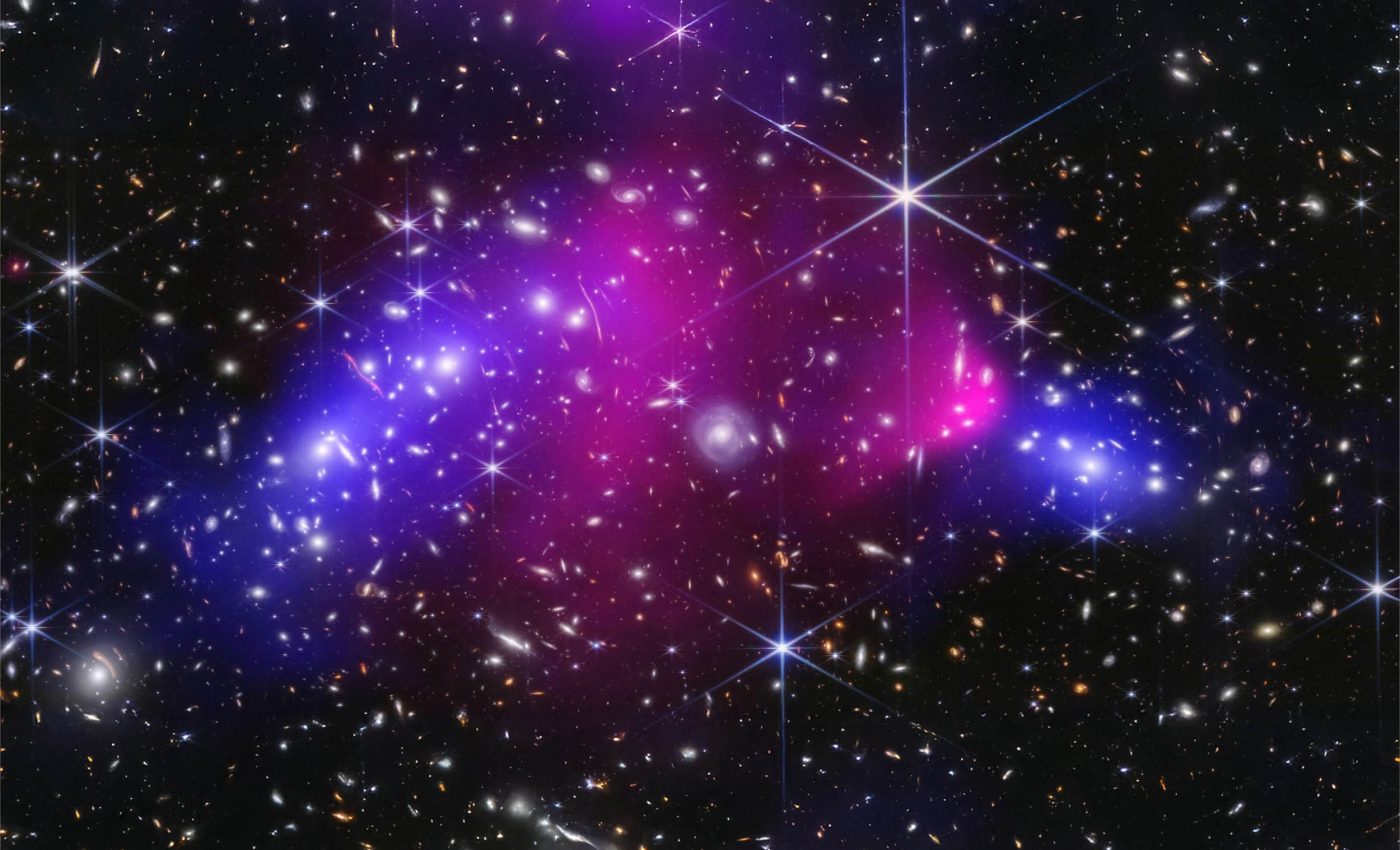 Webb telescope uncovers secrets of dark matter in cosmic collision zone
