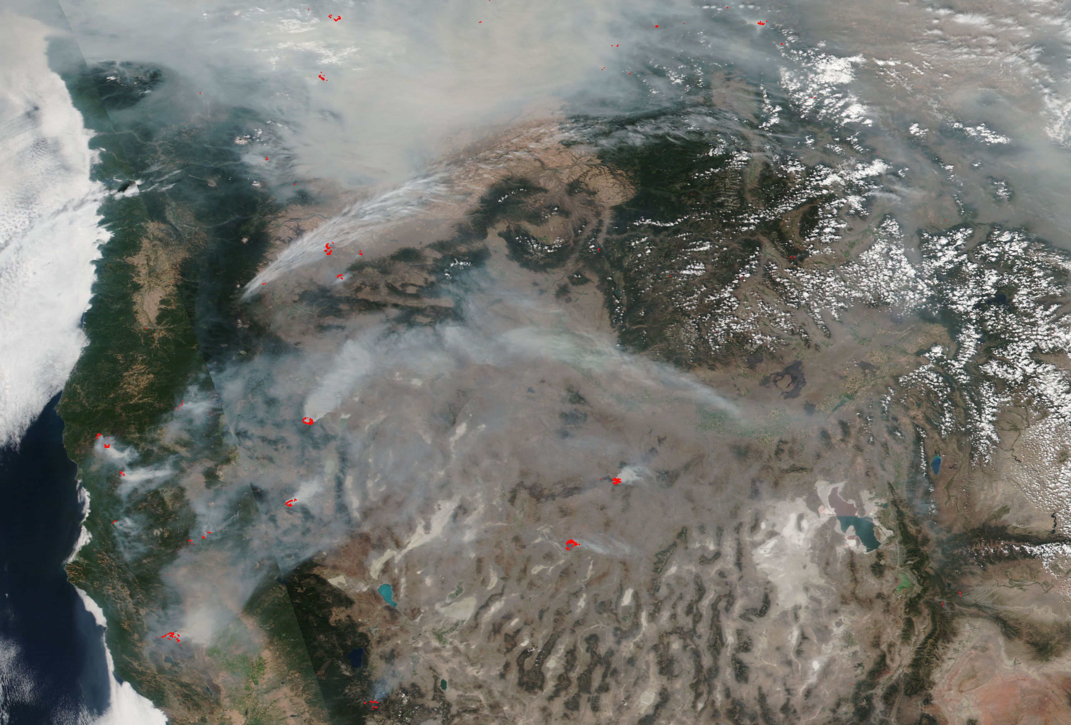 Wildfires are burning across nearly two million acres in the US