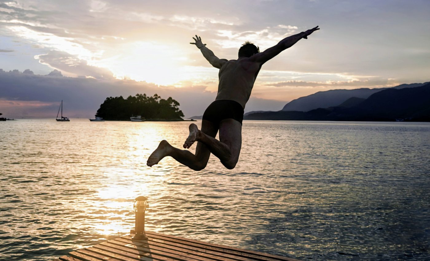 What causes the brain to initiate spontaneous actions?