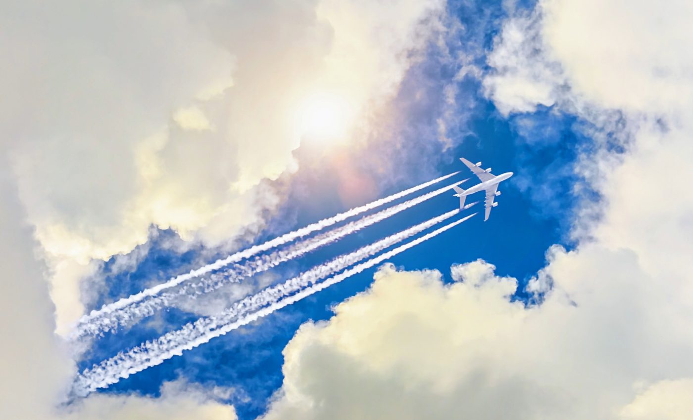 How do airplane contrails impact Earth's climate?
