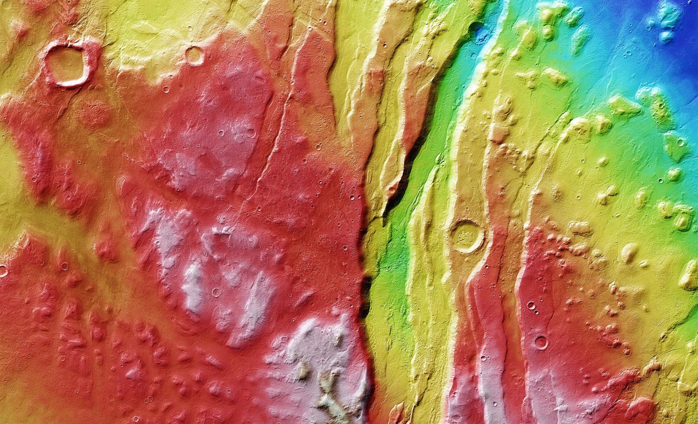 Massive valleys, cracks, and canyons are frozen in time on Mars